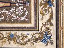 Ornate Brown Patterned Rug Mosaic with Blue Flowers close-up