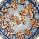 Лапчатка, мозаика-медальон крупным планом